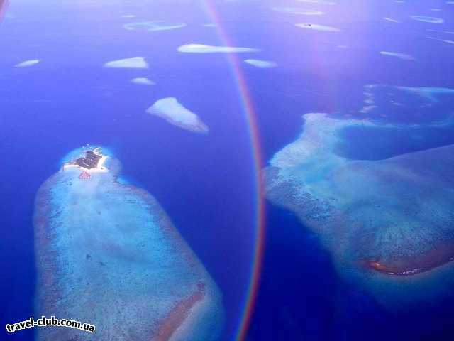  Мальдивские о-ва  Sun Island  Радуга. Съёмка с гидросамолёта.