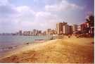 > Кипр > Фалмагуста  Пляж. Песок. Впереди город, в котором никто не живет пос